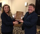 CeCe Moore receives Surname DNA Journal Award presented br Brad Larkin